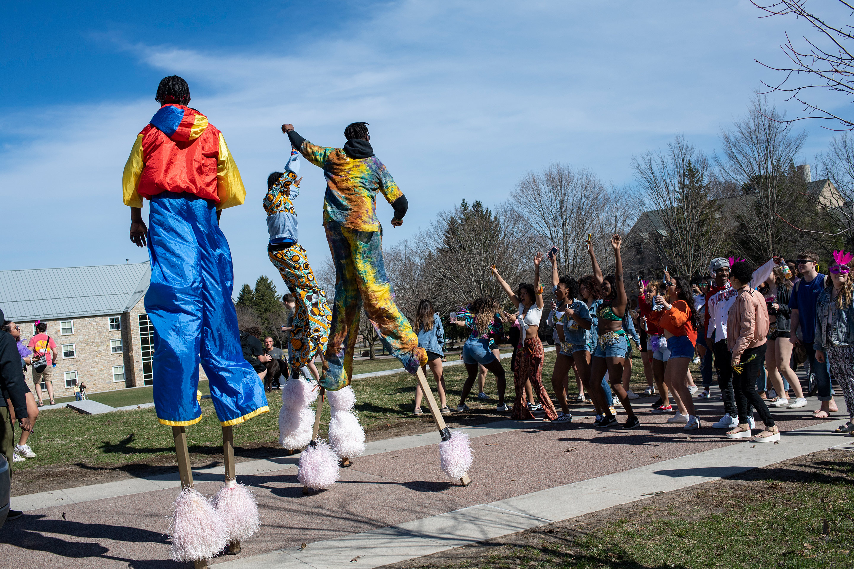 People walking on stilts