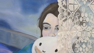 painting of woman with lace and toy bunny
