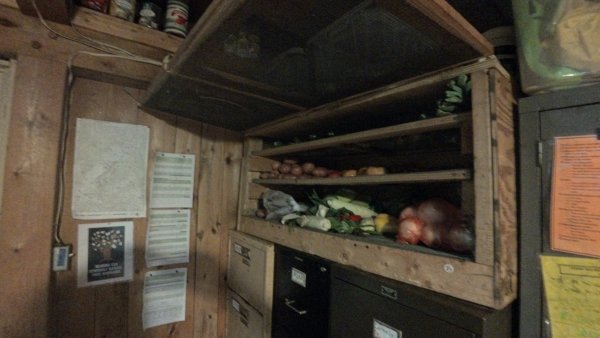 Veggies are stored in a mouse-proof cage in the kitchen.