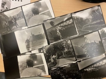 Contact sheets of black and white images taken with a large format camera. 