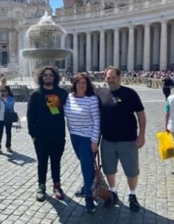 Luke stands with his family in Vatican City