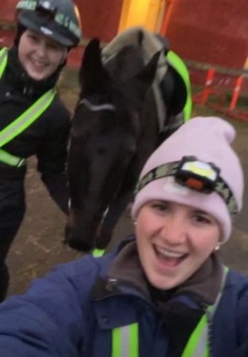 Sophia with a friend and a horse