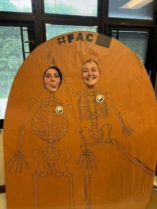 Students posing as skeletons